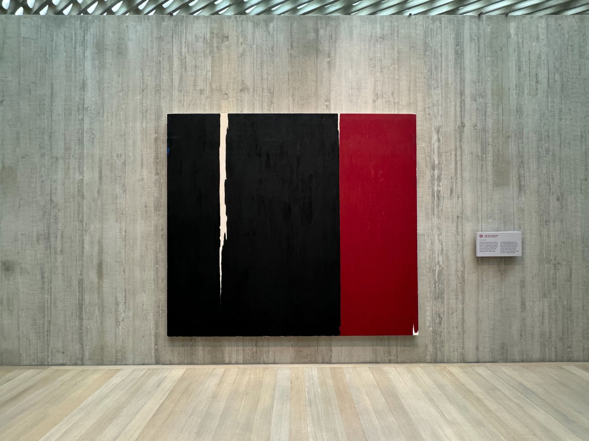 Large black and red abstract painting by Clyfford Still