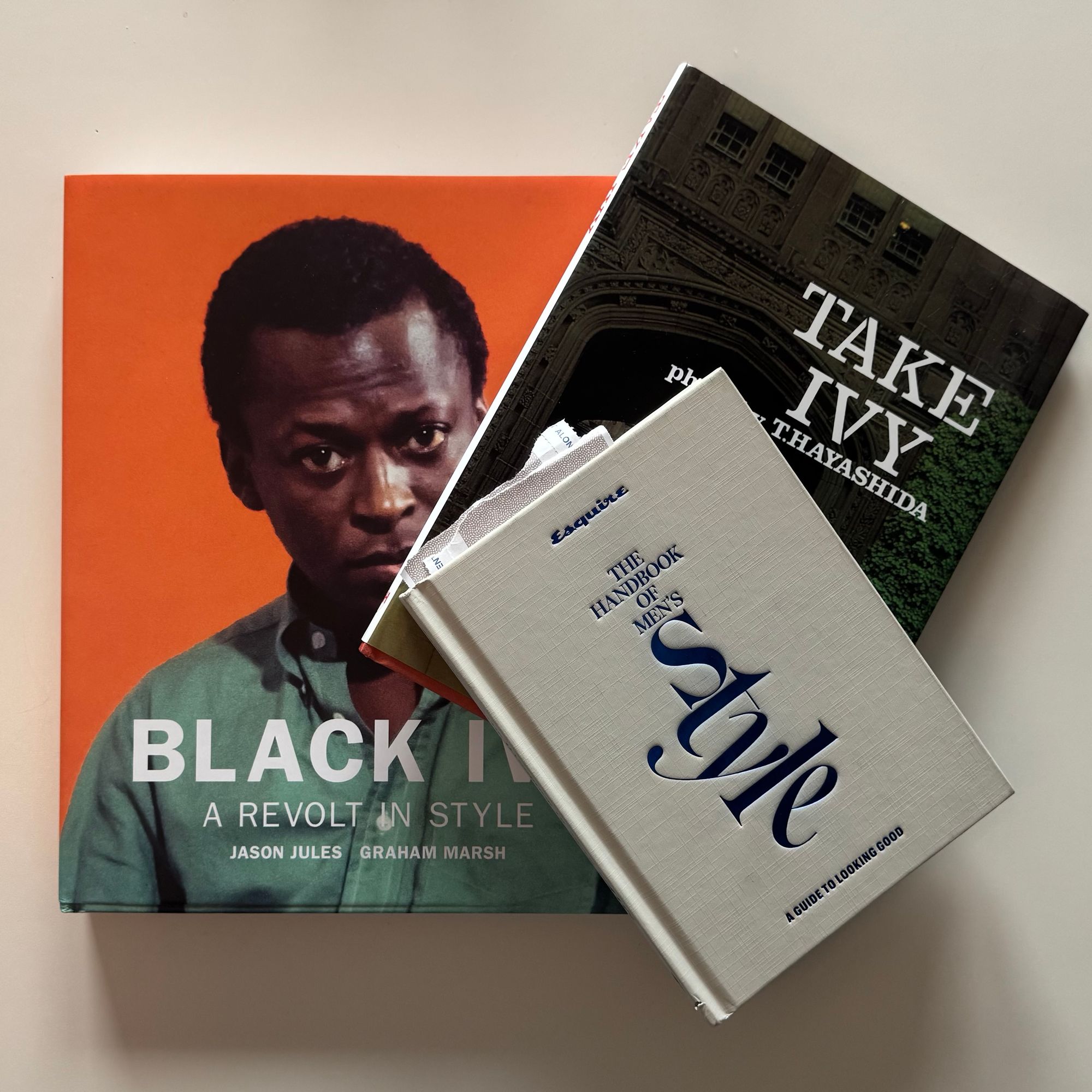 "Esquire's Handbook of Style" laid atop "Take Ivey" laid atop "Black Ivy"