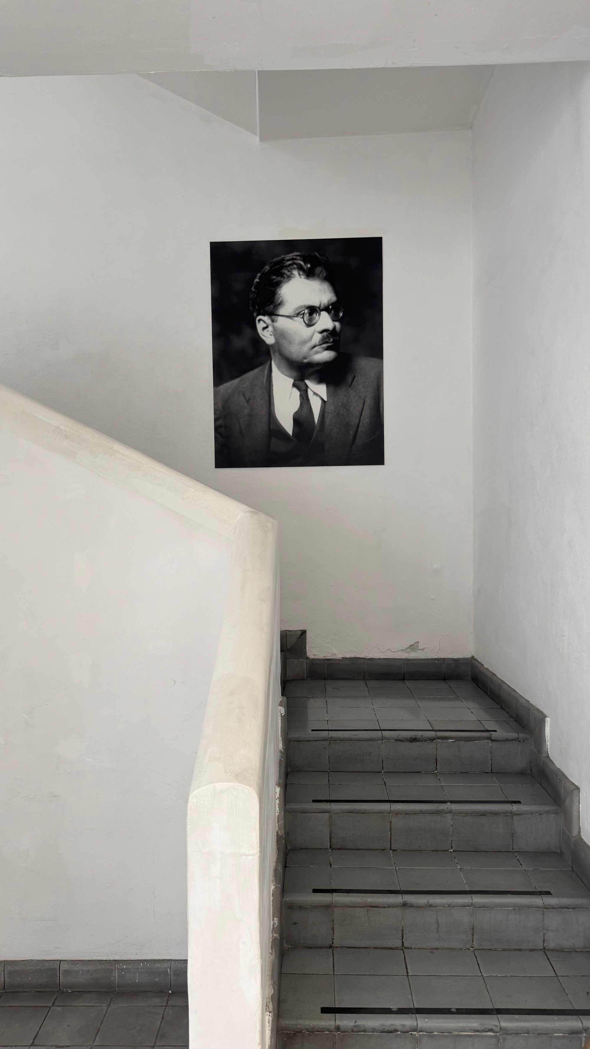 Orozco glares from a photo hung in a stairwell