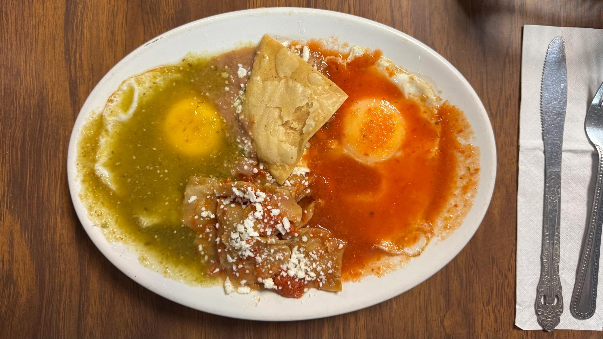 Huevos divorciados - divorced eggs, eggs cooked your way in two sauces, with beans.