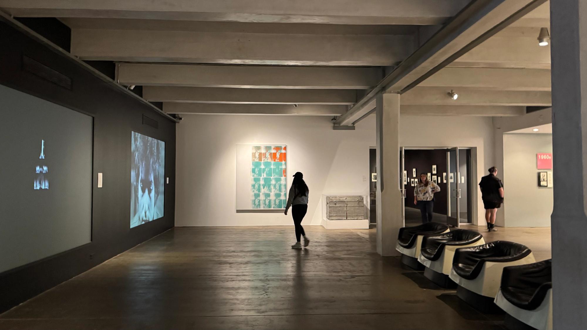 A video wall featuring “Empire” and a “screen test” short film