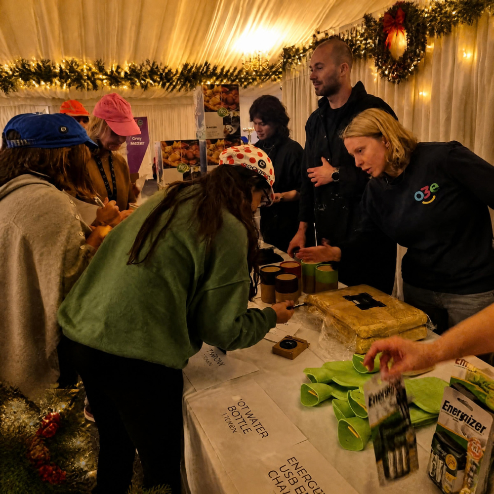 Teams collecting their items from the charity shop