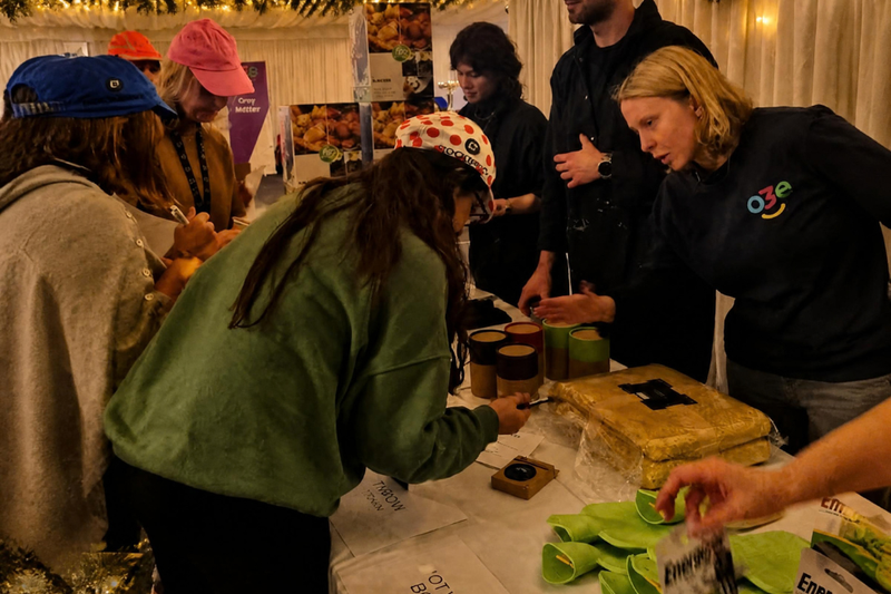 Teams collecting their items from the charity shop