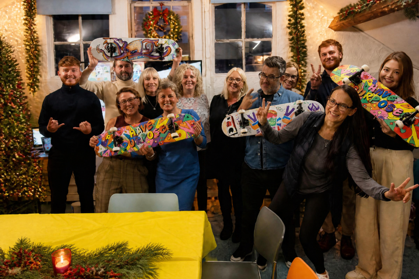 Team celebrating thei Festive Skateboard Team Build event