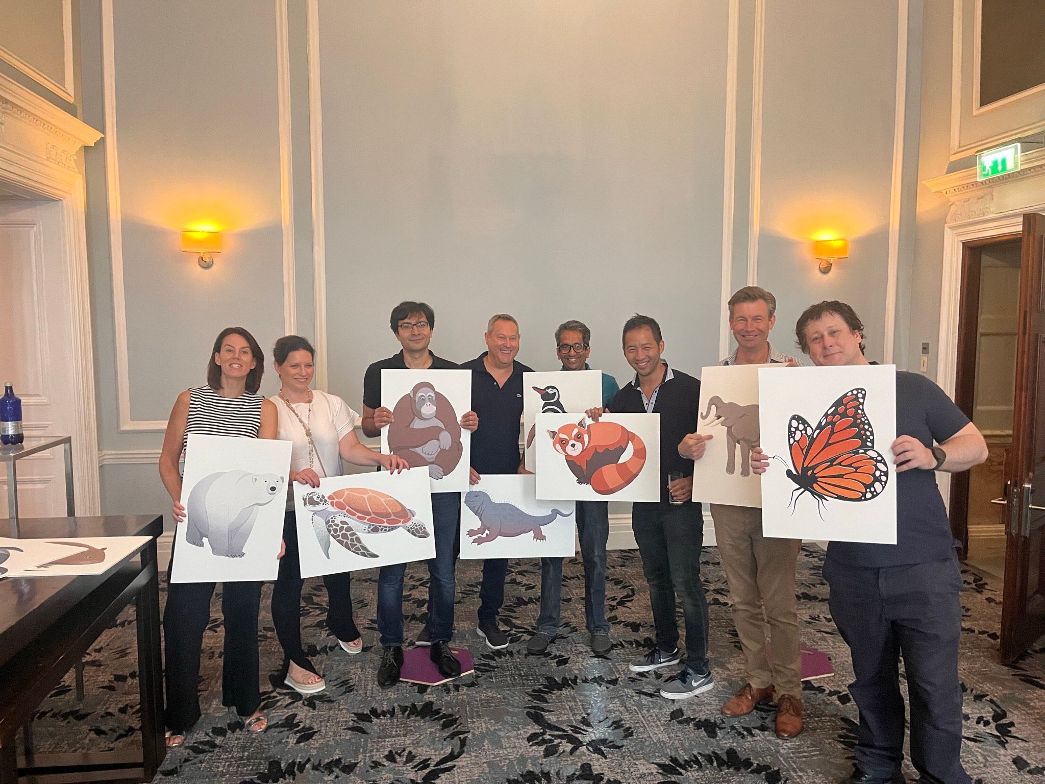 Teams holding up the endangered species effected by climate change as part of the climate change challenge