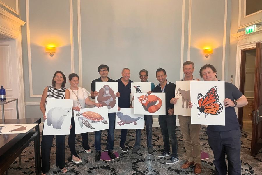 Teams holding up the endangered species effected by climate change as part of the climate change challenge