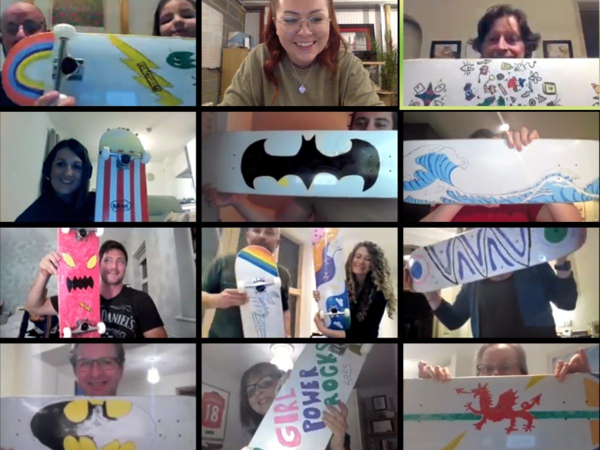 A video call grid of people holding up what they made