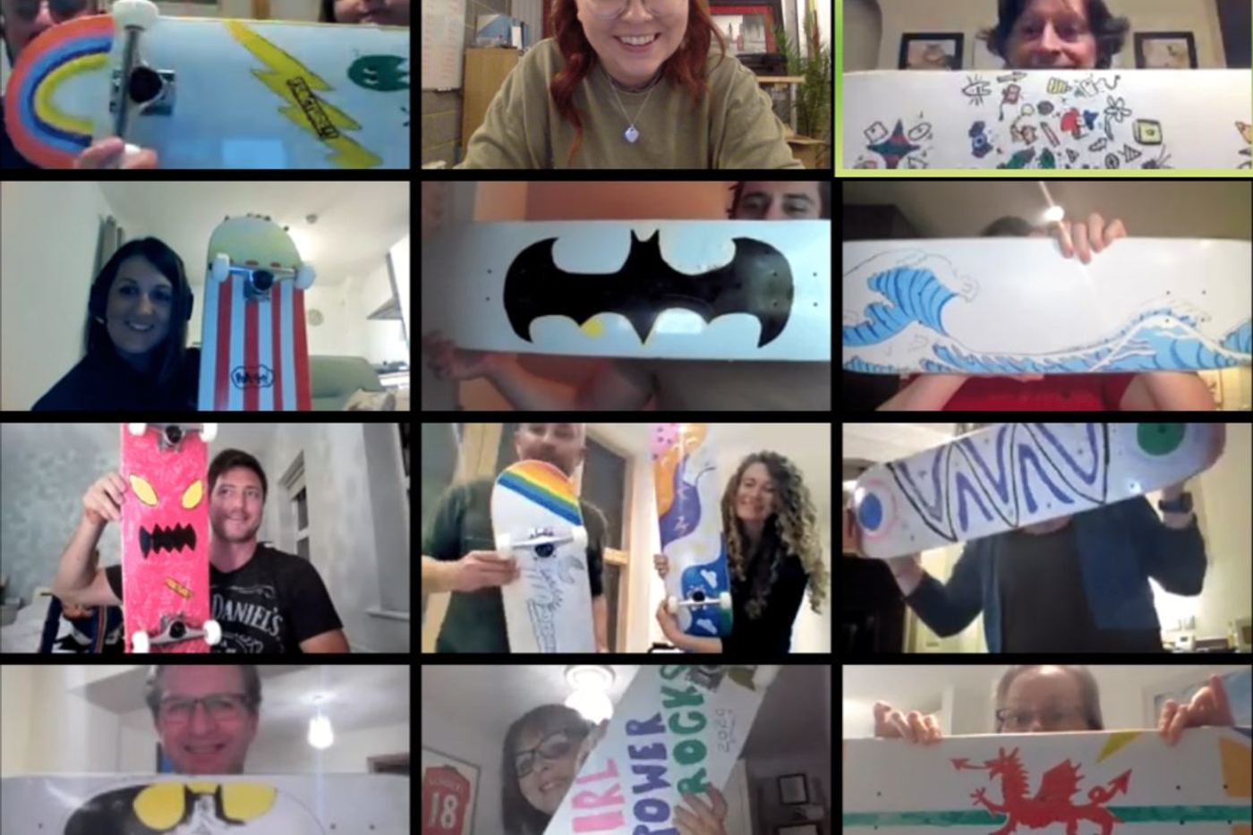 A video call grid of people holding up what they made