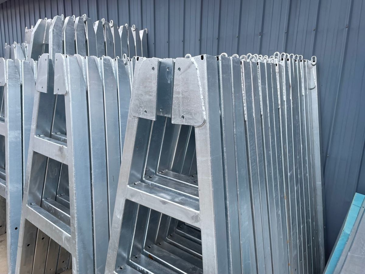 Premium steel sheets and hot-dip galvanized chassis materials stored at the Chris Machinery factory