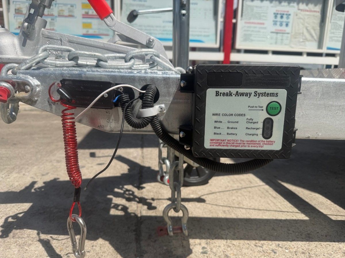 Electric breakaway brake system unit mounted on a Chris Machinery trailer tow hitch A-frame