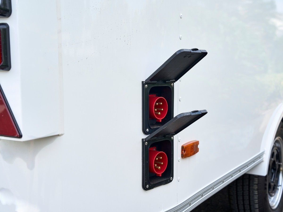 Waterproof exterior power inlet sockets fitted on a Chris Machinery mobile food trailer
