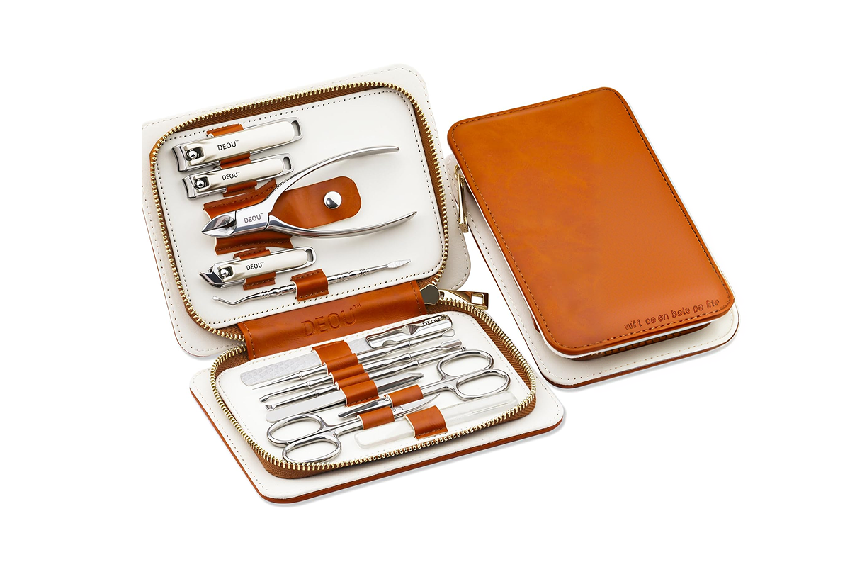 A set of professional, surgical-grade stainless steel manicure and pedicure buffer tools arranged neatly in a leather casing.