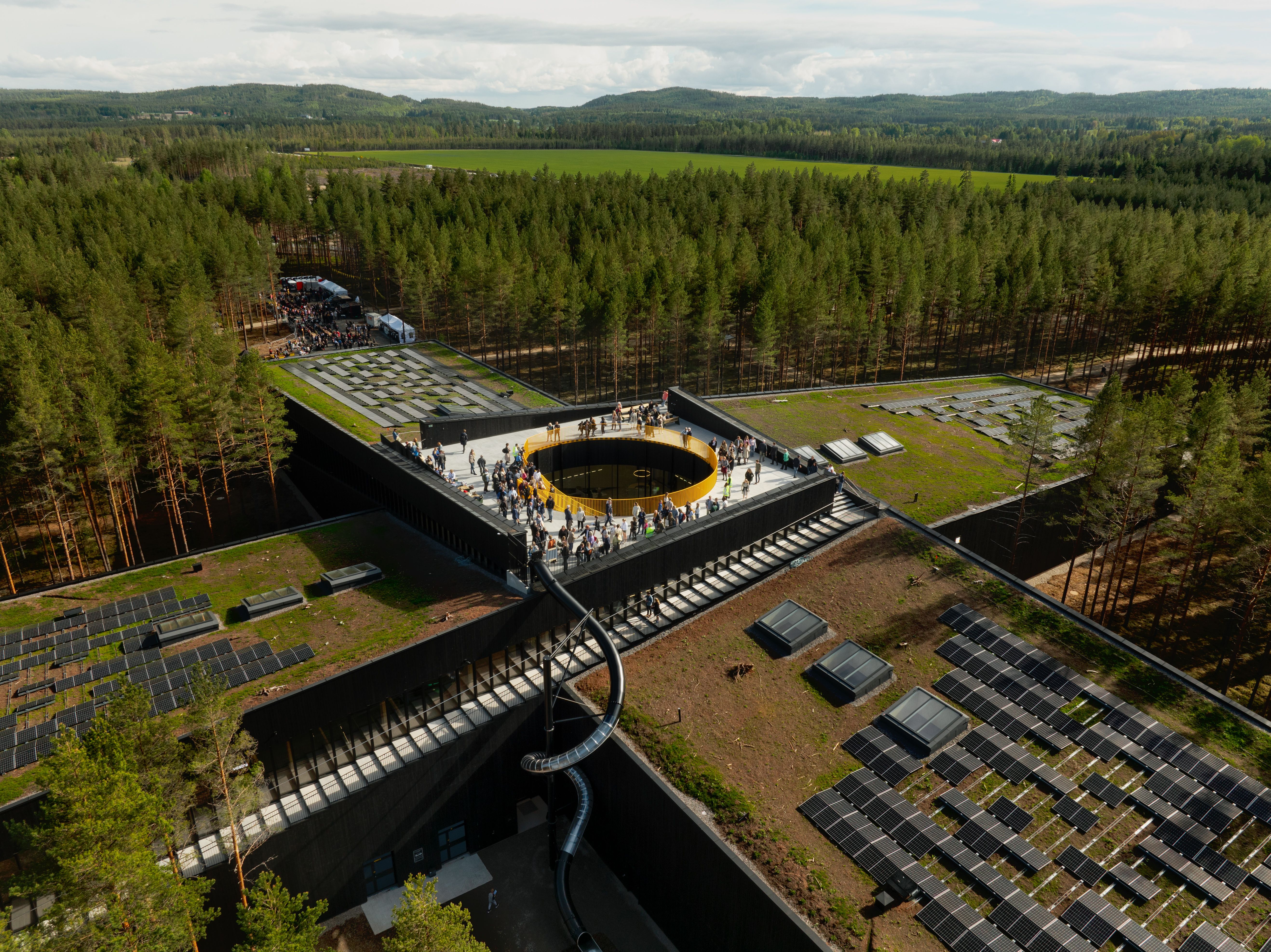 Who has contributed to building the world's most environmentally friendly furniture factory, The Plus?