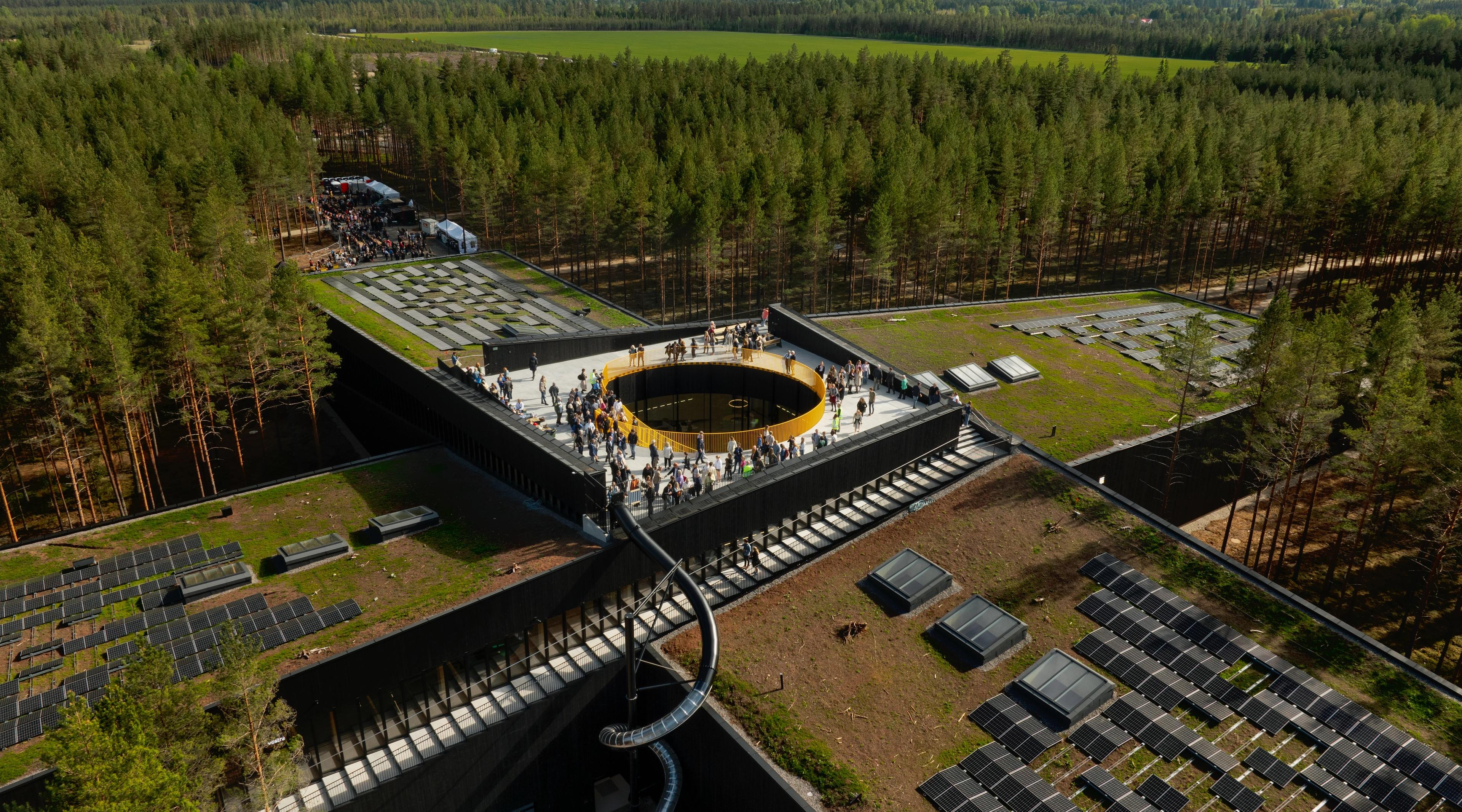 Who has contributed to building the world's most environmentally friendly furniture factory, The Plus?