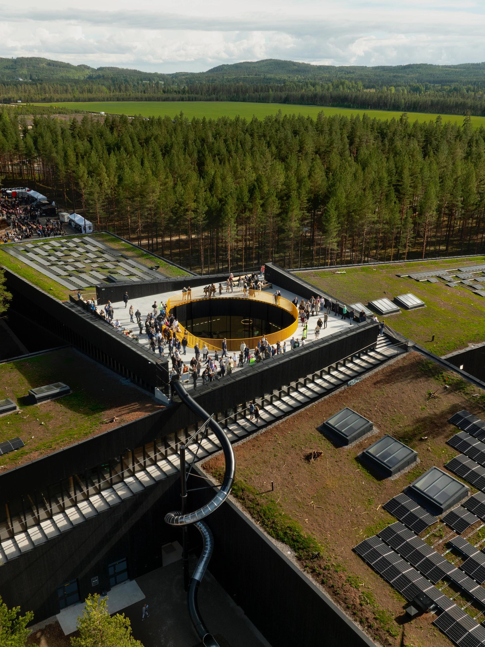 Who has contributed to building the world's most environmentally friendly furniture factory, The Plus?