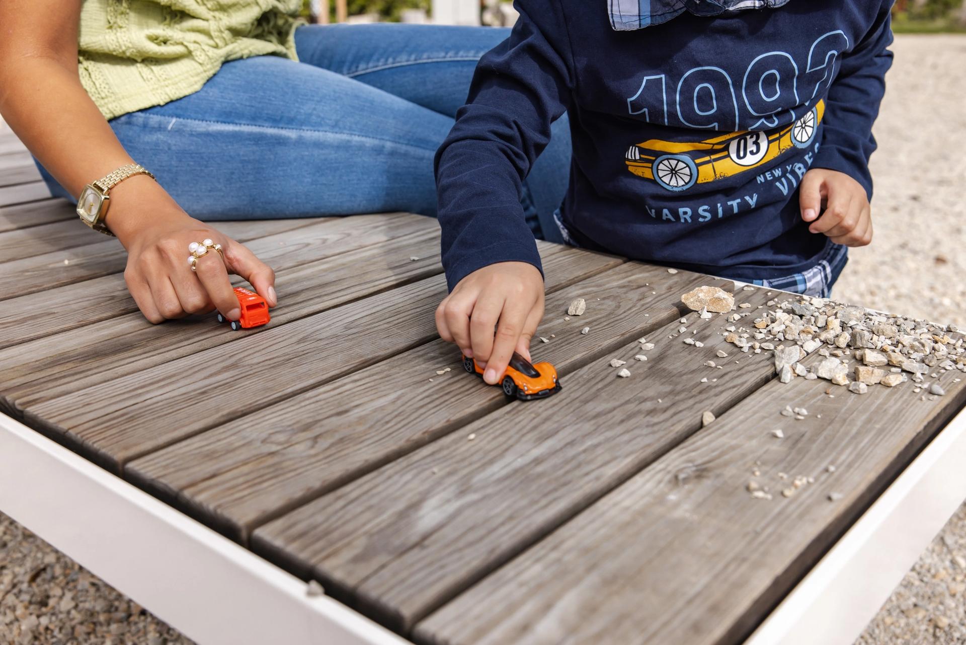 An outdoor space connecting kindergarten and neighborhood