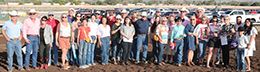 The winning connections of Miss Hi Tide accept the $50,000 New Mexico State Fair Derby [RG3] trophy at the Downs at Albuquerque on Sunday.