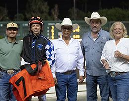Champion trainer Marc Jungers and champion jockey Christian Ramos with the connections of Sgt Pepper Feature Handicap winner Lethal Cowboy 123 in the Los Alamitos winner's circle.