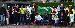 The winning connections of Princesa Bury accept the Derby Garanones trophy at the Hipodromo de las Americas on Sunday.