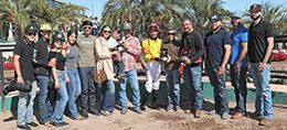 The winning connections of ZM Jess accept the $35,000 Desert Classic Derby at Turf Paradise on Saturday.