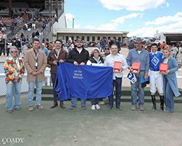 The winning connections of Kissmeifyoukan accept the $298,150 307HR Open Quarter Horse Futurity on Sunday.
