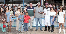 The winning connections of S Super King accept the New Mexico Breeders' Futurity stakes trophy on Saturday at SunRay Park.