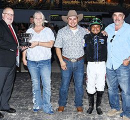 The winning connections of Louisiana Mystery accept the Governors Cup Marathon Stakes trophy at Sam Houston Race Park.
