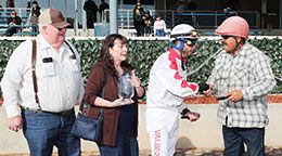 The winning connections of El Vital accept the $150,000 New Mexico Classic 870 Stakes trophy at Zia Park on Sunday.