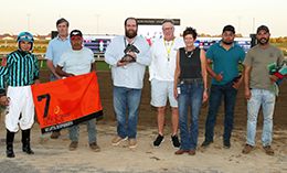 The winning connections of RR Lotta Runforrobyn accept the Adequan Derby Challenge trophy at Horseshoe Indianapolis on Tuesday.