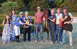 The winning connections of Had To Be Fabulous accept the Ontario Bred Derby trophy at Ajax Downs on Sunday.