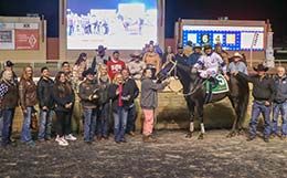The winning connections of Js On Fire accept the AQHA Remington Park Challenge Championship trophy at Remington Park on Sunday night.