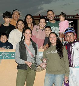 Holy The winning connections of L Conejo accept the North Star State Derby stakes trophy Wednesday at Canterbury Park.