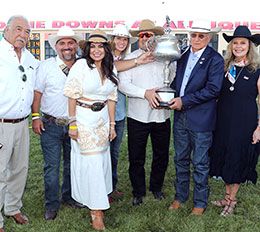Ruidoso Downs owners Johnny and Jana Trotter present the All American Futurity trophy to Leo and Norma Olivarez friends and family.