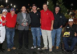 The winning connections of Lotta Big Love accept the $47,993 Texas Classic Juvenile Stakes trophy at Lone Star Park on Saturday.