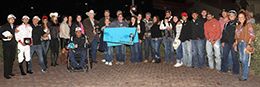 The winning connections of Allikat Dynasty accept the Cox Ranch Distaff Challenge Championship-G1 trophy at Albuquerque Downs on Saturday.
