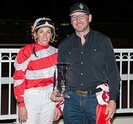 Justine Klaiber and Kasey Willis in the winner’s circle after the $35,000 Denim N Diamonds Handicap at Los Alamitos.