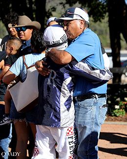 Javier Rodriguez of Feliz Montana Ranch congratulates jockey Luis Martinez after winning the Ruidoso QH Derby.