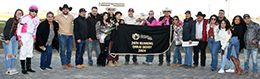 The winning connections of Full Boogie accept the $133,400 QHRAI Derby trophy at Horseshoe Indianapolis on Saturday.