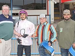 The winning connections of Easy Perry Cartel accept the La Plata Stakes trophy at SunRay Park.