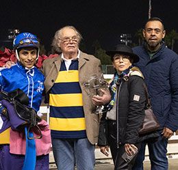 Winning owners Robert Guttman and Laura Levy with trainer Jose Flores and jockey Ricardo Ramirez.
