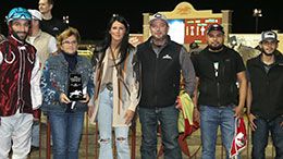 The connections of Bella Vista Farms, LLC accept the Lone Star Park Leading Owner award on Saturday.