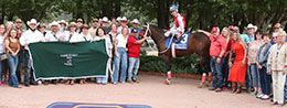 The winning connections of Hezgotthelook Z in the Ruidoso QH Futurity winner's circle on Sunday.