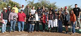 The winning connections of Jess My Dynasty accept the e $67,380 AQRA Turf Paradise Open Quarter Horse Derby trophy on Tuesday.