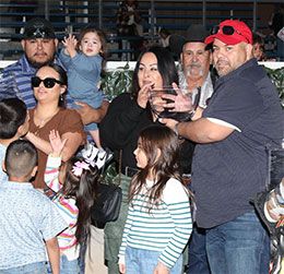 The winning connections of Bv Bridgette Cartel accept the New Mexico Classic Futurity stakes trophy at Zia Park on Sunday.