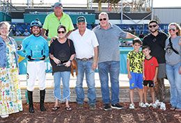 The winning connections of Vesper Martini accept the Masterpiece Derby stakes trophy at Fair Meadows Saturday.