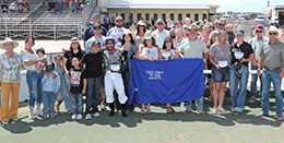 The winning connections of Out Law Jess accept the Unita County Accredited Wyoming Bred Maturity stakes trophy.