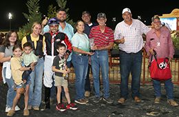 The winning connections of Ima Chili accept the $11,150 Texas Paint Horse Breeders' Association Juvenile trophy at Delta Downs on Thursday.