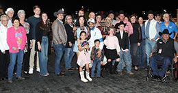 The winning connections of Cowboys Gun Z accept the Refrigerator Championship trophy.
