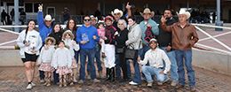 The winning connections of Js Freightrain accept the $100,000 Hobbs America Derby Invitational trophy at Zia Park on Sunday.
