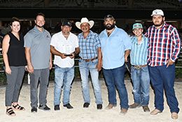 The winning connections of Frankie Jr accept the $44,800 Silver Bullet Stakes trophy at Retama Park on Thursday.